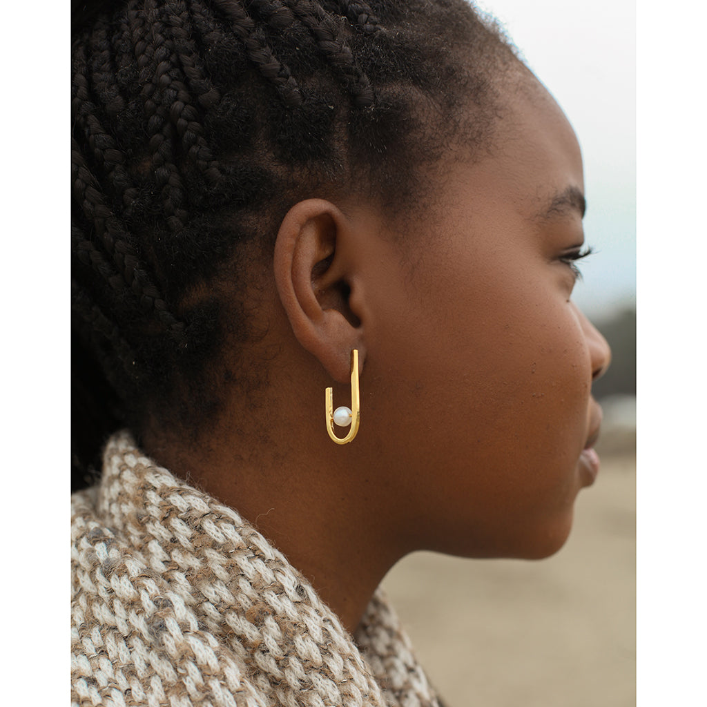 Large pearl drop hoop earrings in gold vermeil by Kate Wood Jewellery |  Finematter