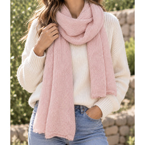pink alpaca scarf on model
