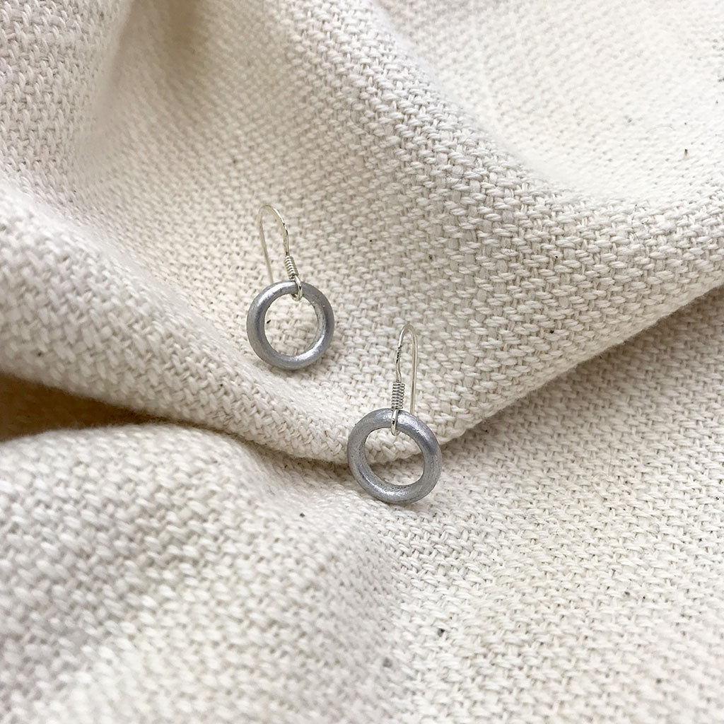 recycled bomb circle earrings
