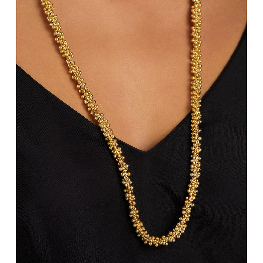 Long gold necklace