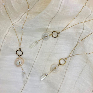 solar quartz and crystal y necklaces